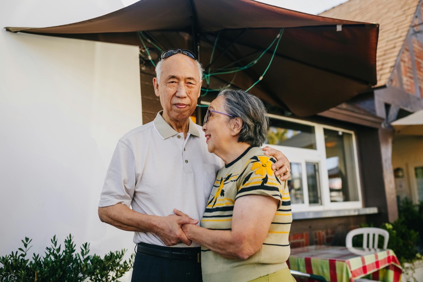 A senior walking confidently outdoors